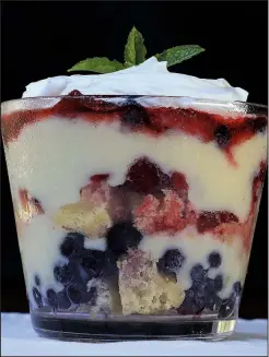  ?? Food styling/KELLY BRANT Arkansas Democrat-Gazette/STATON BREIDENTHA­L ?? Easy Mixed Berry Trifle