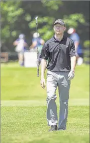  ??  ?? Amateur Hayden Springer tosses his club after his ball landed in the water at hole No. 11 on Friday during the FedEx St. Jude Classic second round at TPC Southwind. Springer finished with a 7-over 147 to miss the cut.