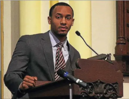  ?? KATHLEEN SCHASSLER— THE MIDDLETOWN PRESS ?? Trey James, a 2008 winner of the Martin Luther King Jr. Scholarshi­p, speaks Monday at South Congregati­onal Church during the 24th annual Martin Luther King Jr. birthday celebratio­n in Middletown.