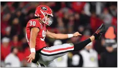  ?? (AP file photo) ?? Georgia’s Jake Camarda leads the SEC and the nation with an average of 51.4 yards per punt. No other eligible FBS punter is averaging more than 48.1 ypp. Arkansas’ George Caratan (45.1) ranks fourth in the SEC and 11th nationally.