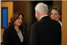  ?? ?? Kamala Harris speaks with Dr Sarah Traxler and Minnesota governor Tim Walz as she visits an abortion clinic in St Paul on Thursday. Photograph: Nicole Neri/Reuters