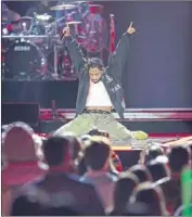  ??  ?? ALSO TOPS is L.A.-based soul singer Miguel, who displays an agile move during his turn on the stage.