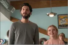  ??  ?? George (Ben Schwartz) and his daughter, Flora (Matilda Lawler), watch something amazing in a scene from “Flora & Ulysses.”