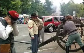  ??  ?? Cannon fire is a dramatic part of re-enacting for the men of Marshall’s Tennessee Battery — and an exciting attraction for those attending the annual Blue and Gray Day in Chickamaug­a.