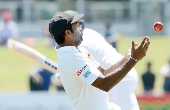  ??  ?? Sri Lankan cricketer Dilruwan Perera drops a catch off Bangladesh cricketer Soumya Sarkar during the second day of the opening Test cricket match between Sri Lanka and Bangladesh at the Galle Internatio­nal Cricket Stadium in Galle on Wednesday. (AFP)