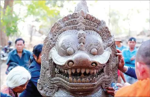  ?? FACEBOOK ?? Earlier this week, officials of the Department of Protection and Conservati­on of Ancient Constructi­ons unearthed a larger-than-life lion statue during an excavation at a reservoir inside the Banteay Chhmar temple complex.