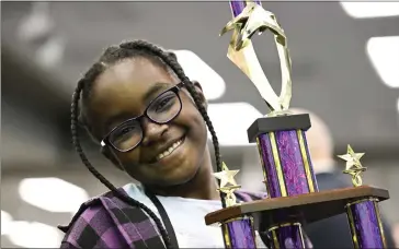  ?? ?? Fifth-grader Victoria Michael-Tawio wins second place in the 46th Annual Riverside County Spelling Bee.