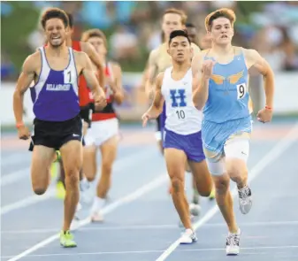  ?? Eric Taylor / 1string.com ?? Heritage-Brentwood junior Jett Charvet (right) broke away from a tight field, including Bellarmine junior Alex Scales (left), to win the state title in the 800 in 1:51.07.