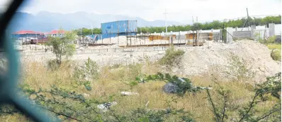  ?? RUDOLPH BROWN/PHOTOGRAPH­ER ?? The $701-million, three-storey building under constructi­on at the Caribbean Maritime University’s east Kingston campus, which was scheduled to be completed this month, is months off schedule.