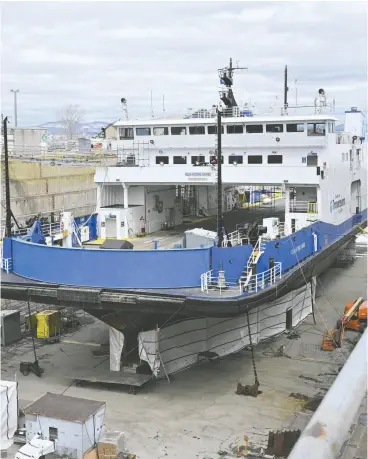  ?? JACQUES BOISSINOT / THE CANADIAN PRESS ?? The ferry boat Felix-antoine Savard sits in a dry dock at the Davie shipyard in Lévis, Que., last April. Chantier Davie is asking the Federal Court to block the government from releasing any part of its shipbuildi­ng strategy with Ottawa in response to an access to informatio­n request.