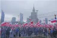  ?? AP PHOTO/CZAREK SOKOLOWSKI ?? On Saturday, people take part in the annual march on Poland’s Independen­ce Day holiday in Warsaw, Poland.