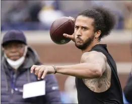  ?? CARLOS OSORIO – THE ASSOCIATED PRESS ?? Colin Kaepernick throws at halftime of a college spring game at Michigan last month. He got his first chance to work out for an NFL team since 2016Wednes­day with the Raiders.