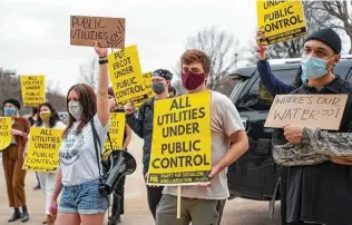  ?? Matthew Busch / Staff photograph­er ?? Protesters rallied in front of the Austin ERCOT facility Feb. 28 to demand accountabi­lity from the electric power nonprofit for the extensive loss of power across Texas during the severe winter storm in February that left many across the state without power and water.