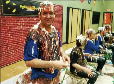  ?? BILL RETTEW JR. – DIGITAL FIRST MEDIA ?? Chesterbro­ok Academy Elementary School Principal Joe Rodia is transforme­d into a human ice cream sundae. Students were rewarded for exceeding a reading goal.