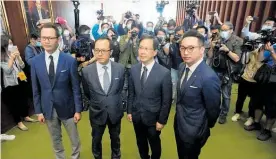  ?? Photo / AP ?? Hong Kong lawmakers (from left) Dennis Kwok, Kenneth Leung, Kwok Ka-ki and Alvin Yeung.