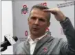  ?? MITCH STACY — THE ASSOCIATED PRESS ?? Ohio State NCAA college football head coach Urban Meyer gestures while speaking at a Sept. 17 press conference in Columbus.