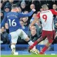  ??  ?? Leg break McCarthy is struck by Rondon’s boot