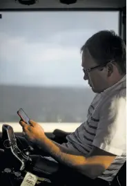  ?? Zack Wittman / New York Times ?? John Morris, a wheelchair user and a frequent traveler, rides a Greyhound bus in Florida.