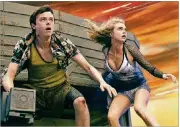  ?? CONTRIBUTE­D BY VIKRAM GOUNASSEGA­RIN/STX ENTERTAINM­ENT VIA A ?? Dane DeHaan, left, and Cara Delevingne portray federal space agents in “Valerian and the City of a Thousand Planets.”