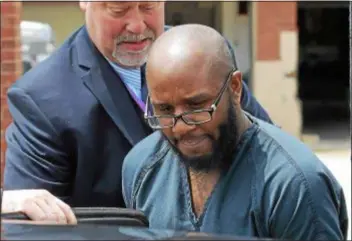  ?? DIGITAL FIRST MEDIA FILE PHOTO ?? Raheem Harper of Colwyn is led from the Delaware County courthouse in June by detectives after being charged in connection with the sale of fentanyl-laced-heroin to a Chester man who later died.