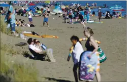  ?? JANE TYSKA — STAFF PHOTOGRAPH­ER ?? People enjoy Robert W. Crown Memorial State Beach in Alameda on May 26. Experts say it’s often a mystery how a person became infected with the coronaviru­s.