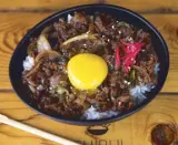  ??  ?? Gyudon, a heavenly bowl of rice topped with sukiyaki beef and shiitake mushroom