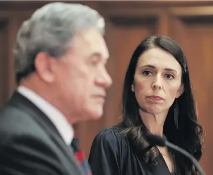  ??  ?? New Zealand’s coalition, led by Prime Minister Jacinda Ardern and NZ First leader Winston Peters, has come under strain after Peters backed away from a hallmark justice policy. Photo: Hagen Hopkins