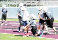  ?? Michael Burchfiel/Herald-Leader ?? Siloam Springs’ sixth-grade team made a big stop by intercepti­ng an extra point attempt in the end zone.