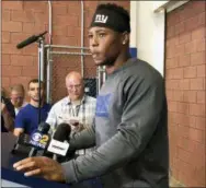  ?? TOM CANAVAN — THE ASSOCIATED PRESS ?? Giants running back Saquon Barkley speaks to the media in East Rutherford, N.J., Monday.