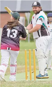  ??  ?? David Butterwort­h watches on as the bails are whipped off by Natalie Holmes in the Division 6 game between Longwarry and Yarragon.
