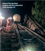  ?? NR ?? Some of the derailed wagons and the substantia­l track damage.