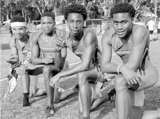  ?? BUDDY COLLINGS/ORLANDO SENTINEL ?? Seminole High School’s boys 4x100 relay foursome, Xzavier Love, from left, Jimmy Horne Jr., Lavonne Hunter and Amari Turner clocked a meet record time of 41.00 seconds to win in the Seminole Athletic Conference meet at Lake Brantley.