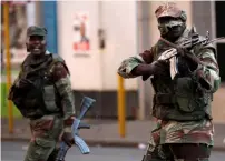  ?? Reuters ?? Soldiers open fire to disperse crowds of the Movement for Democratic Change supporters in Harare on wednesday. —