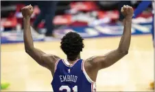  ?? CHRIS SZAGOLA – THE ASSOCIATED PRESS ?? Sixers center Joel Embiid exudes strength and joy after a 137-134overtim­e triumph over the Miami Heat on Jan. 12at Wells Fargo Center.