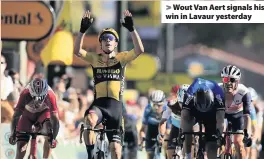  ??  ?? > Wout Van Aert signals his win in Lavaur yesterday