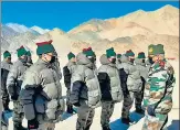  ?? ANI ?? Chief of Defence Staff General Bipin Rawat (right) interacts with soldiers deployed in the forward areas of Ladakh on January 12.