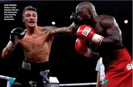  ?? Photos: ACTION IMAGES/ANDREW COULDRIDGE ?? NEW SIGNING: Parker cracks Kindele with his left during his first showing under the Sauerlands