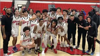  ?? PHOTO BY RYAN MENZIE ?? Cleveland celebrates after its overtime victory over Chatsworth on Friday that netted a piece of the West Valley League title.