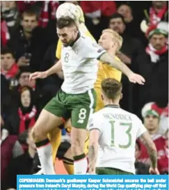  ??  ?? COPENHAGEN: Denmark’s goalkeeper Kasper Schmeichel secures the ball under pressure from Ireland’s Daryl Murphy, during the World Cup qualifying play-off first leg soccer match between Denmark and the Republic of Ireland at Parken stadium in Copenhagen....