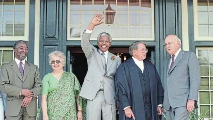  ?? IMAGES/ORYX MEDIA ARCHIVE/BENNY GOOL Picture: FILE/GALLO ?? NEW ERA: Former president Nelson Mandela waves during the opening of the historic first session of the democratic parliament in 1994, outside Tuynhuis in Cape Town. With him were then deputy president Thabo Mbeki, left, former speaker Frene Ginwala, Kobus Coetzee and then second deputy president FW de Klerk. In in 1994, citizens of all races braved all odds to vote in the first nonracial elections and ushered in a new constituti­on that became the supreme law of the republic under the stewardshi­p of Mandela.