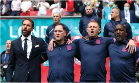  ??  ?? Left to right: England’s manager Gareth Southgate with Steve Holland, Graeme Jones and Chris Powell. Photograph: Alex Morton/Uefa/Getty Images