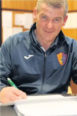  ??  ?? Vital role Match secretary Peter Hickey makes sure EK’s paperwork is in order