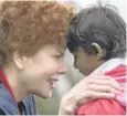  ??  ?? Nicole Kidman as Sue Brierley, and Sunny Pawar as the young Saroo