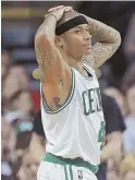  ?? STAFF PHOTO BY MATT STONE ?? WAKE-UP CALL: Isaiah Thomas and the Celtics got a rude reminder by the Bucks on Wednesday night that there are no easy games for the C’s this year.