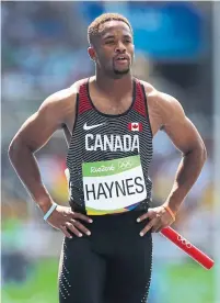  ?? CAMERON SPENCER/GETTY IMAGES ?? Akeem Haynes won Olympic bronze as part of Canada’s 4x100-metre relay team, but his medal doesn’t pay the bills.