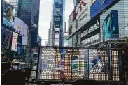  ?? Frank Franklin II / Associated Press ?? Decoration­s to welcome the new year appear Dec. 21 in New York’s Times Square, more than a week before Thursday night’s celebratio­n.