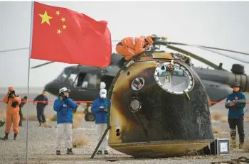  ?? PENG YUAN/XINHUA ?? The return capsule of the Shenzhou-13 manned mission is seen after landing at the Dongfeng site in April in China’s Inner Mongolia Autonomous Region. Strategic rivalry with China’s space program is helping drive NASA’s effort.