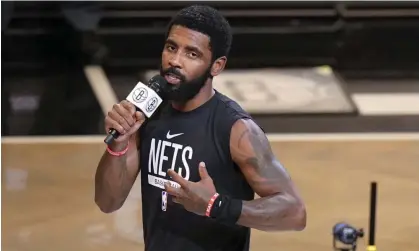  ?? ?? The Brooklyn Nets' Kyrie Irving speaks before the team's game against the New Orleans Pelicans last month. Photograph: Frank Franklin II/AP