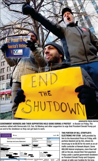  ?? ASSOCIATED PRESS PHOTOS ?? GOVERNMENT WORKERS AND THEIR SUPPORTERS HOLD SIGNS DURING A PROTEST in Boston on Friday. The workers rallied with Democratic U.S. Sen. Ed Markey and other supporters to urge that President Donald Trump put an end to the shutdown so they can get back to work.