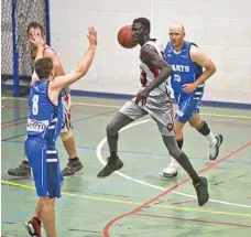  ?? PHOTO: NEV MADSEN ?? JUMPING: Harristown Runnin’ Rebels’ Manylok Malek is out for the rest of the Big Q Basketball season.